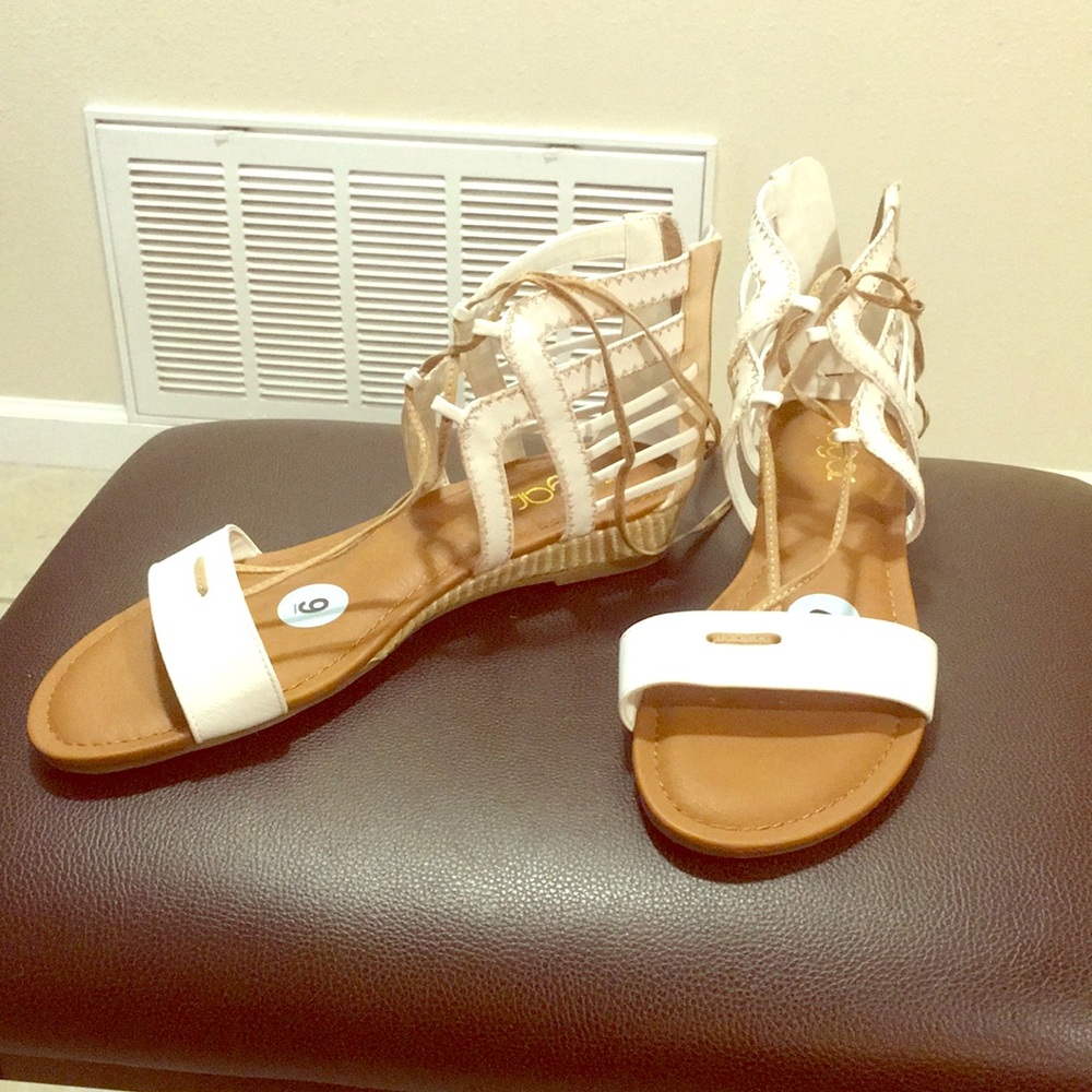 Lace up sandals by sugar . Never used .